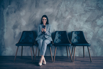 Full length body size photo beautiful she her business lady hands arms telephone look screen wait...