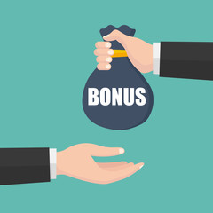 Man holds a bag of money in hand like a bonus. Handing awards concept. Give reward for the job.