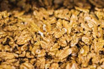 Walnut without shell on the counter of the grocery market. Harvest nutritious nuts in the store.
