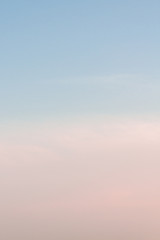 Beautiful sunset sky with feathery pink clouds in spring