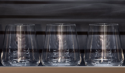 Brandy glasses and whiskey glasses.