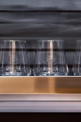 Brandy glasses and whiskey glasses.