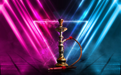 Hookah, smoke on a dark abstract background. Background of empty scenes with multicolored neon lights, reflection of night lights on wet pavement