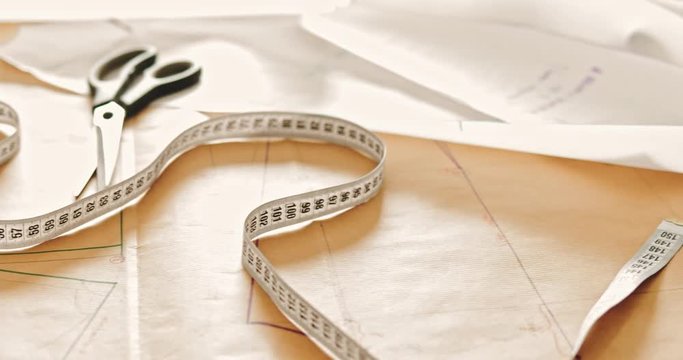 Fashion designer desk with equipment, tailoring and sewing workshop concept