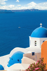 Fototapeta na wymiar Famous Santorini sea view and white church, Greece