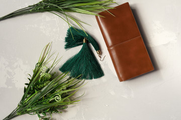 Green earrings and tufts of grass