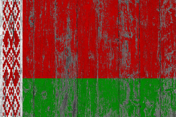 Flag of Belarus painted on worn out wooden texture background.