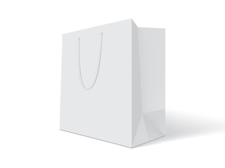 Naklejka premium white paper bag on white background mock up
