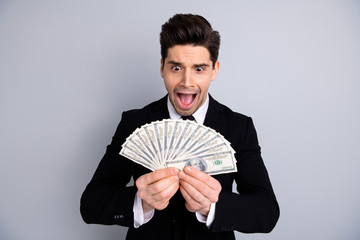 Close-up portrait of his he nice attractive cheerful crazy emotional guy manager financier banker sales agent broker currency lottery credit loan lottery isolated over light gray background