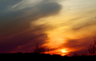Spring evening sunset photo with clouds