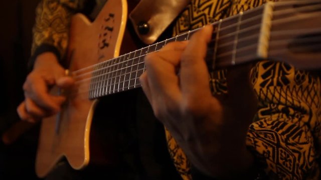 acoustic guitar player