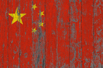 Obraz na płótnie Canvas Flag of China painted on worn out wooden texture background.