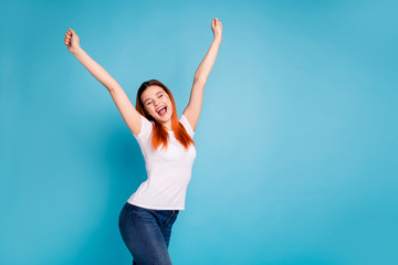 Portrait funny content lady raise hands arms scream yeah celebrate aims goals luck fortune lottery close eyes  delighted thrilled free time weekend isolated  modern youth clothing blue background