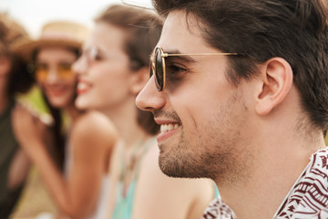 Group of cheerful friends spending time together