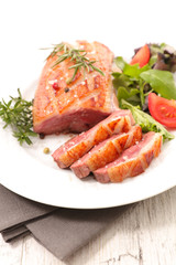 grilled duck steak with lettuce
