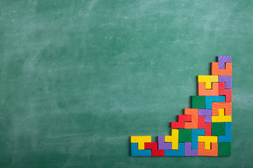 Creative solution for idea - business concept, jigsaw puzzle on the blackboard