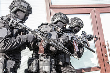 Police counter terrorist team squad storming building