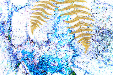 Abstract flowing Ink, gold fern leaf, palm frond on multicolored marble background. Trendy creative design