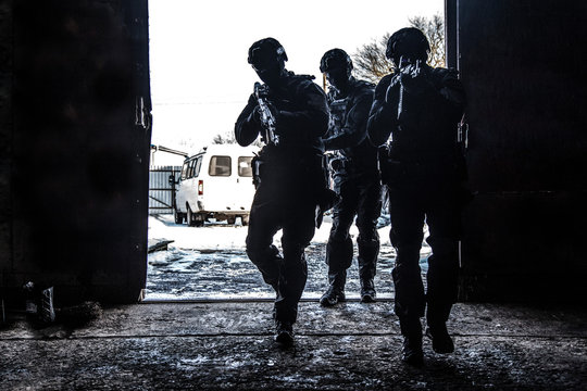 Police Special Operations Group Breaching The Door