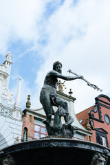 Fototapeta na wymiar Neptune Fountain in Polish Gdansk