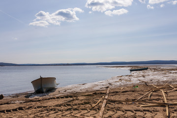 The spring river waiting for a high water in a midland of Russia in the clear sunny day.