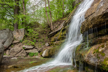 Fototapeta na wymiar New waterfall in Sophia old dendropark, in the city of Uman, Ukraine