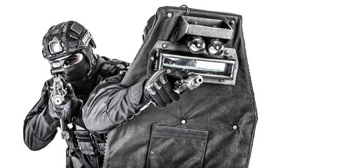 SWAT team behind ballistic shield studio shoot