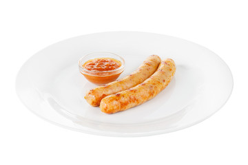 Pork sausages, chicken with tomato sauce isolated