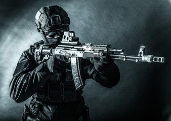 Counter terrorism forces soldier aiming with rifle