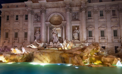 Night view of Rome Trevi Fountain (Fontana di Trevi) in Rome, Italy. Trevi is most famous fountain...