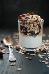 Glass with wholegrain muesli and yogurt