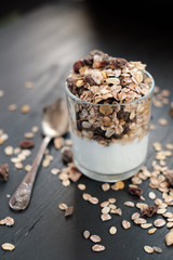 Glass with wholegrain muesli and yogurt