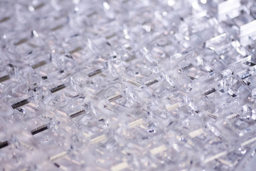 Abstract high-tech geometrical background. Details of transparent plastic or glass. Laser cutting...