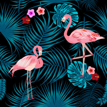 Tropical leaves, flamingo and flowers seamless pattern