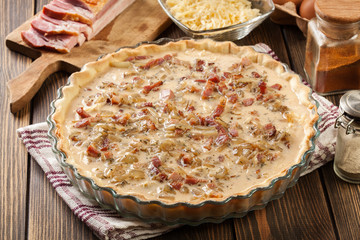 Making stuffing while preparing a traditional quiche