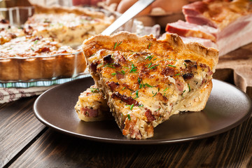 Pieces of quiche lorraine with bacon and cheese