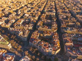 Aerial view of Barcelona Eixample residencial district, Sagrada familia, typical urban squares, Spain.2019