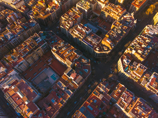 Aerial view of Barcelona Eixample residencial district, Sagrada familia, typical urban squares, Spain.2019