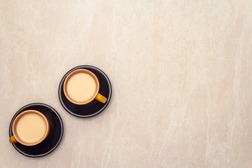 A cup of fresh coffee. The concept on a stone background, top view, copy space, flat lay.