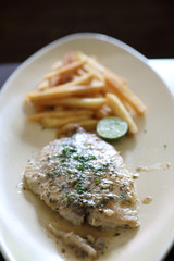 Halibut fillet steak with chips