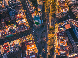 Aerial view of Barcelona Eixample residencial district, Sagrada familia, typical urban squares, Spain.2019