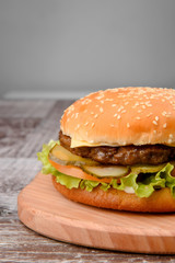 Classic Burger onm wooden background