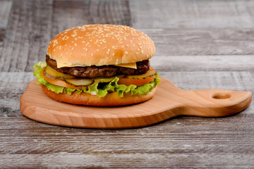 Classic Burger onm wooden background
