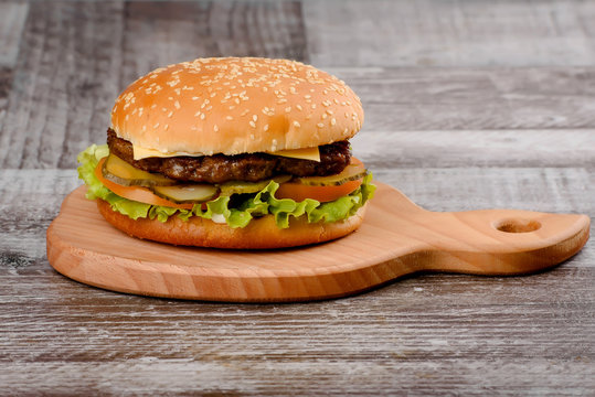 Classic Burger onm wooden background