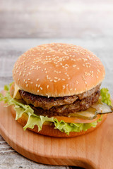 Double Burger wooden background