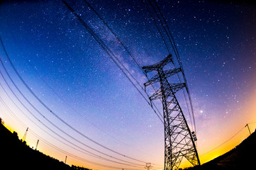 The outline of the power supply facilities and stars at night