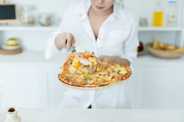 woman enjoying pizza