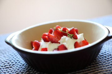 Strawberry with cream on table dessert