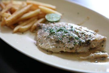 Halibut fillet steak with chips