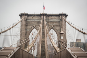 Fototapeta na wymiar General architecture of the famous Brooklyn bridge going to downtown Manhattan - New York City, NY